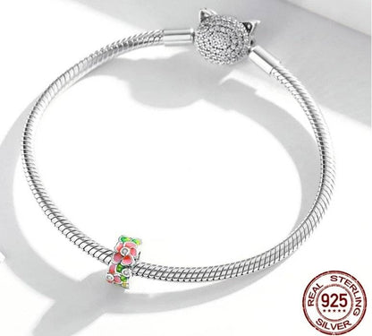 Sterling silver bracelet with Floral Spacer charm