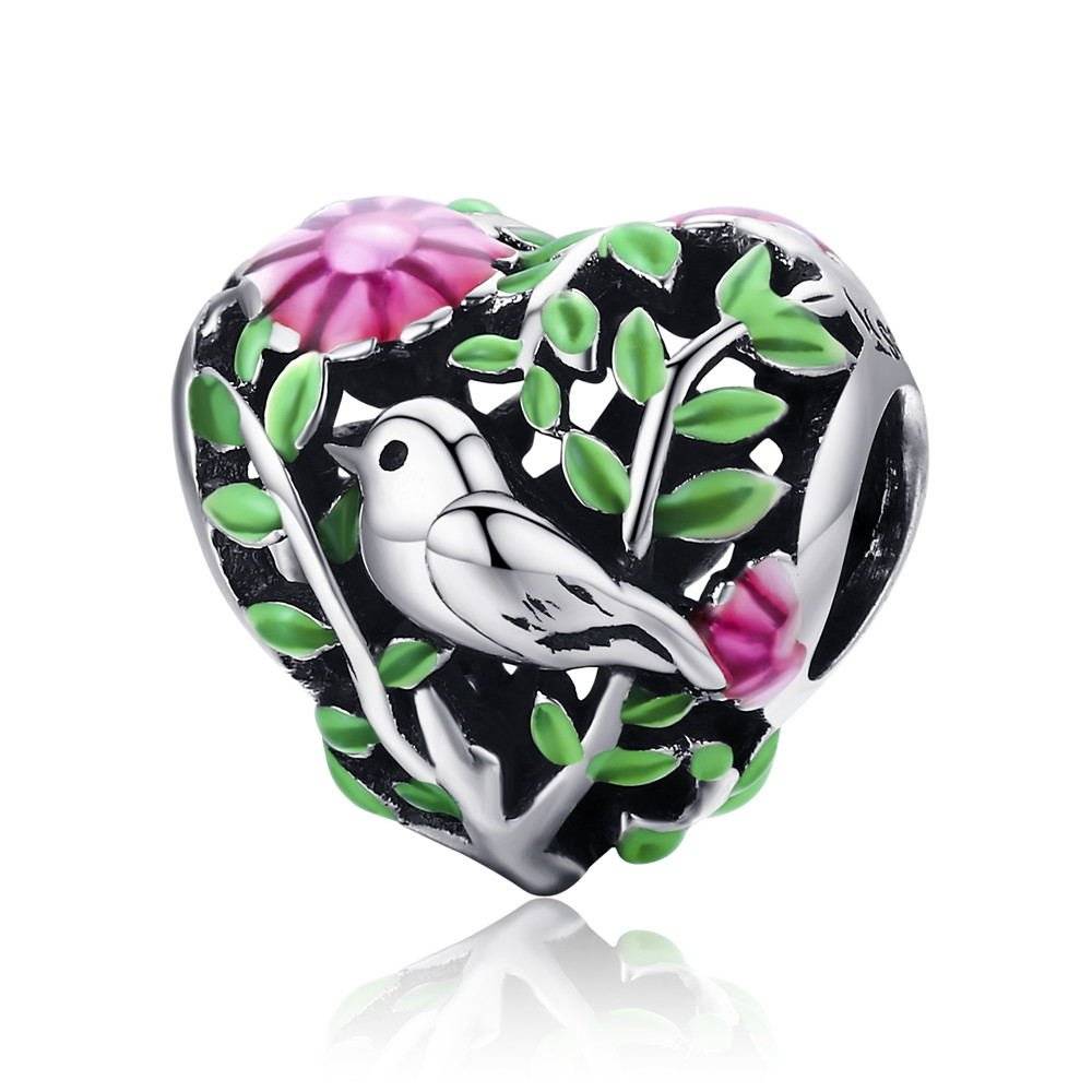 Heart charm with bird and floral design