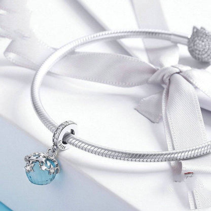 Starlight Charm on a silver bracelet with ribbon